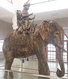 Karikal chola astride Elephant.image.
